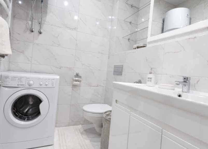 Branchement d’une machine à laver sur l’évacuation des WC : est-ce possible ? Lampe Gras